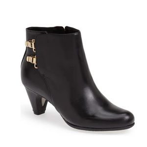 Elegant Black Ankle Boots with Gold Accents
